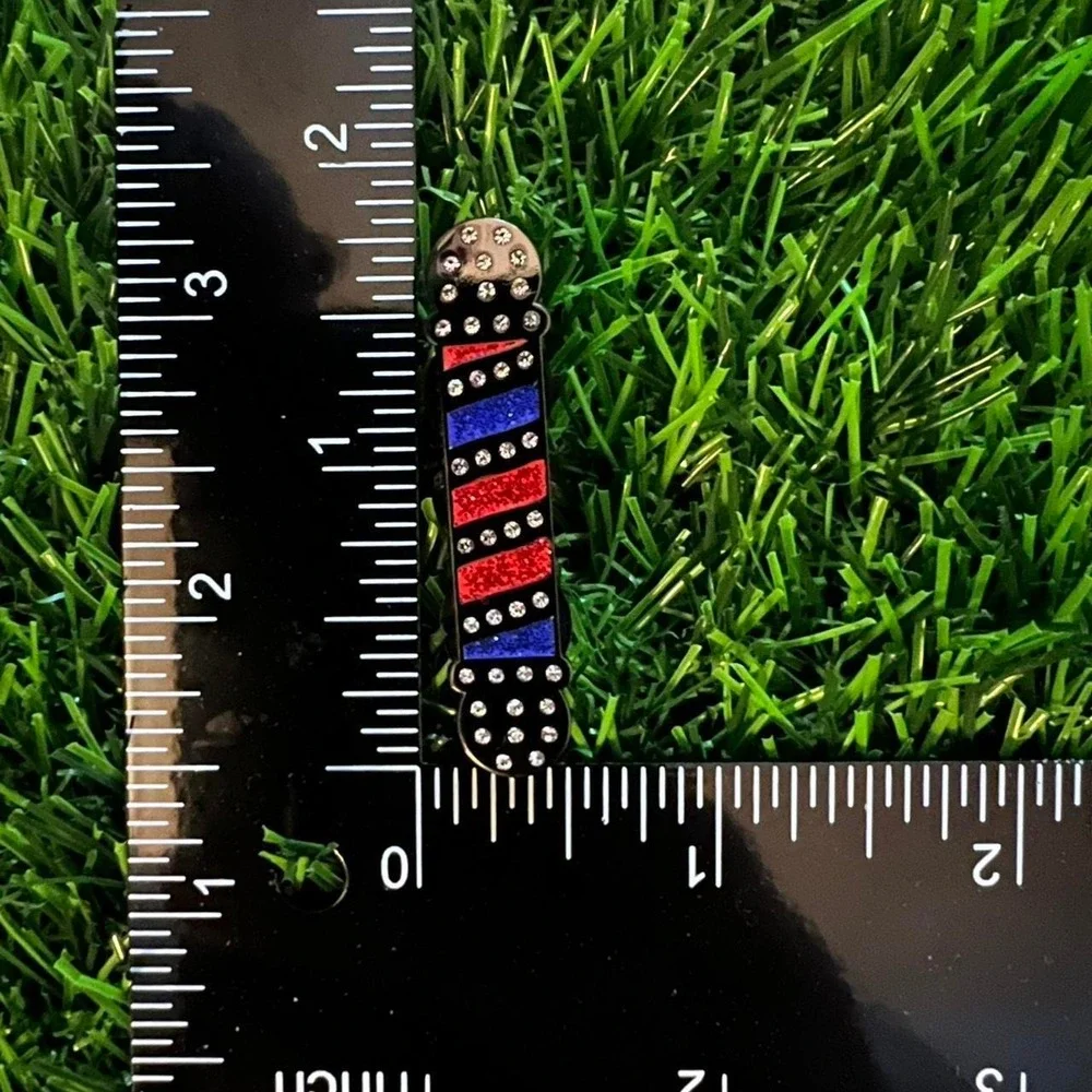 The Unbranded Brand barbershop pin